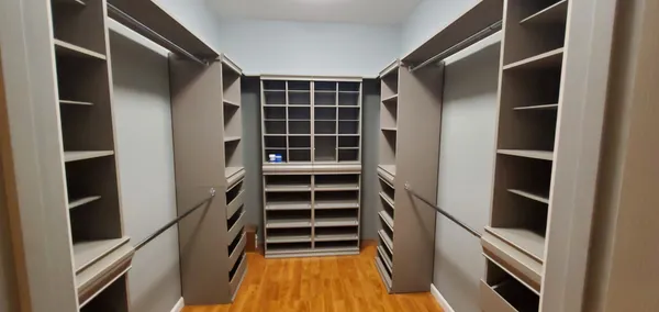 a kitchen with stainless steel appliances granite countertop a refrigerator and a stove