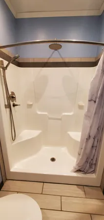 a view of a room that has a fridge