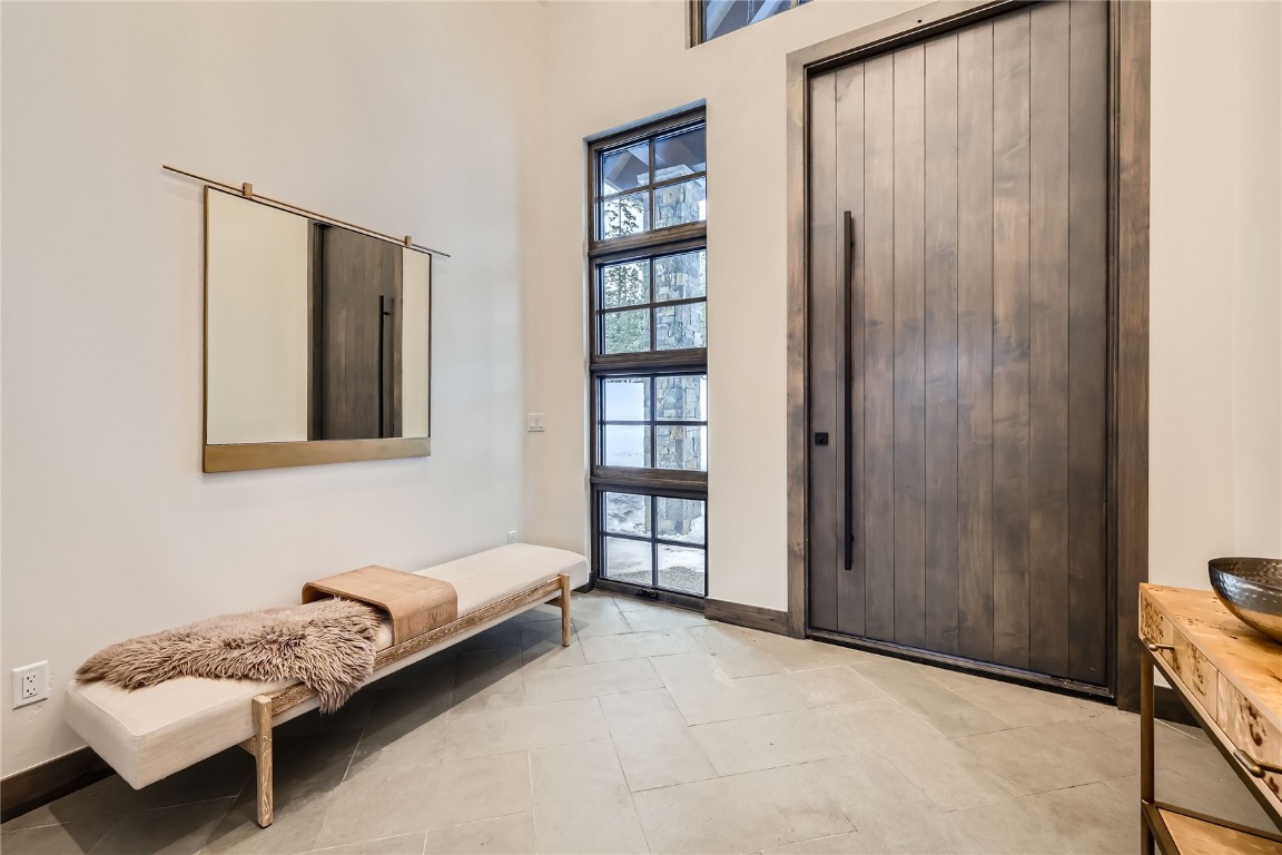 207 Barton Ridge Drive Breckenridge, CO 80424 - Photo 11 of 50 a bedroom with a bed and a window