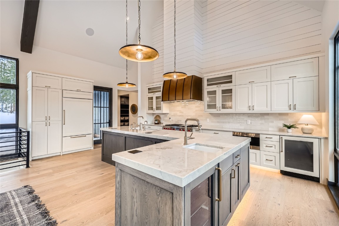 207 Barton Ridge Drive Breckenridge, CO 80424 - Photo 14 of 50 a kitchen with stainless steel appliances granite countertop a sink a stove and cabinets