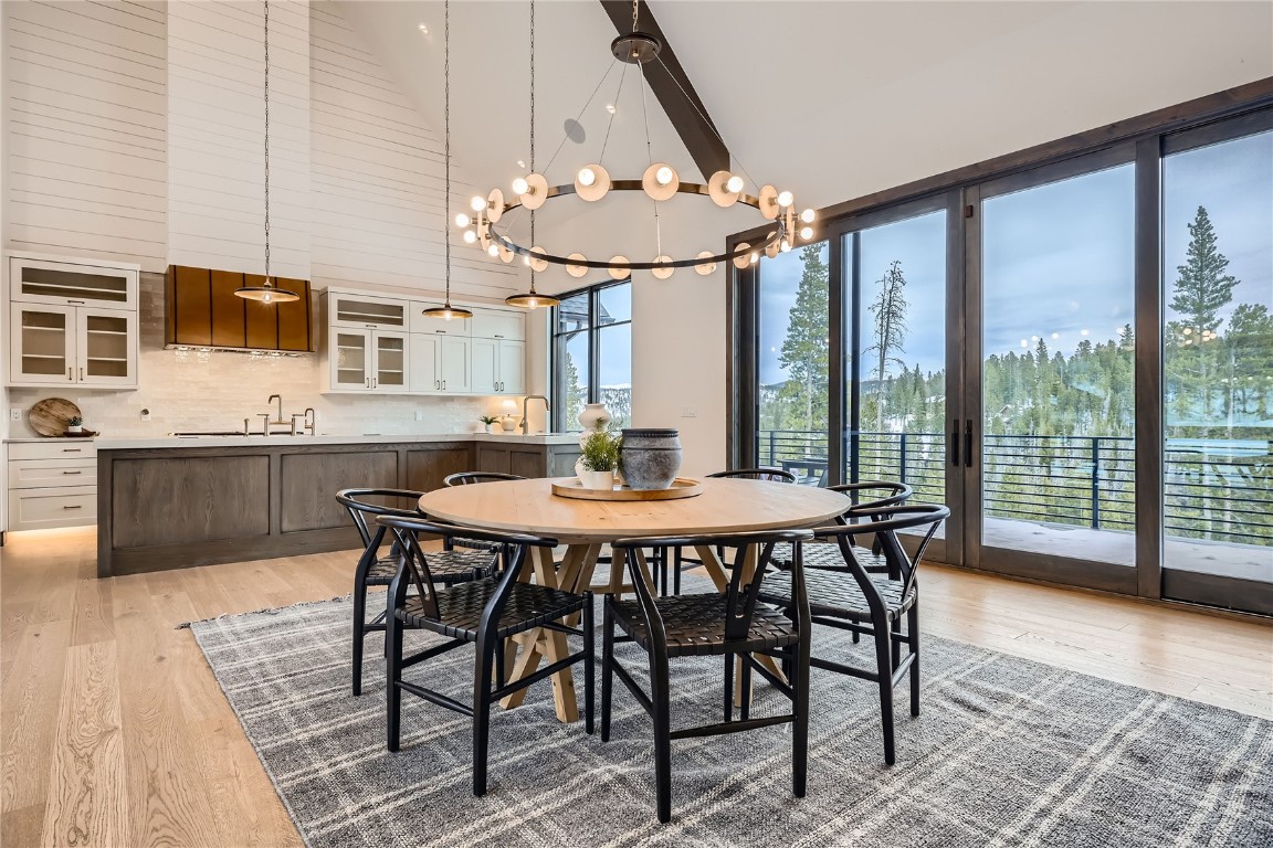 207 Barton Ridge Drive Breckenridge, CO 80424 - Photo 17 of 50 a dining room with furniture and wooden floor