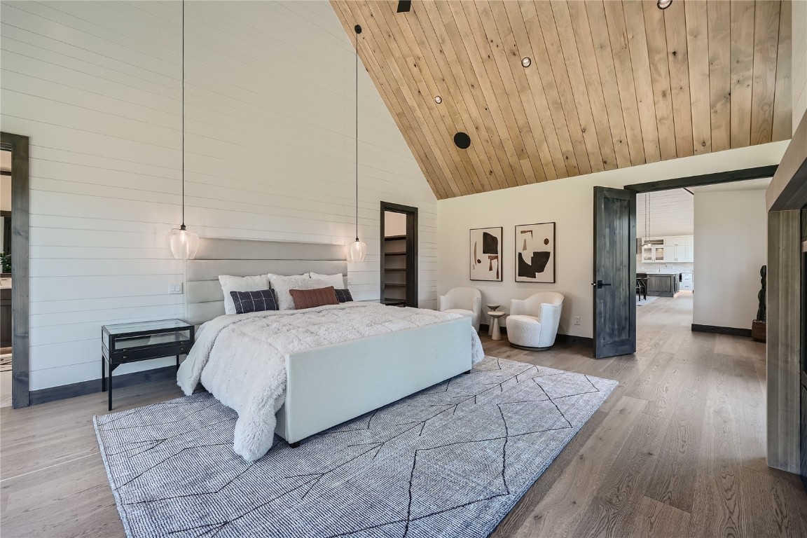 207 Barton Ridge Drive Breckenridge, CO 80424 - Photo 23 of 50 a spacious bedroom with a bed and a table