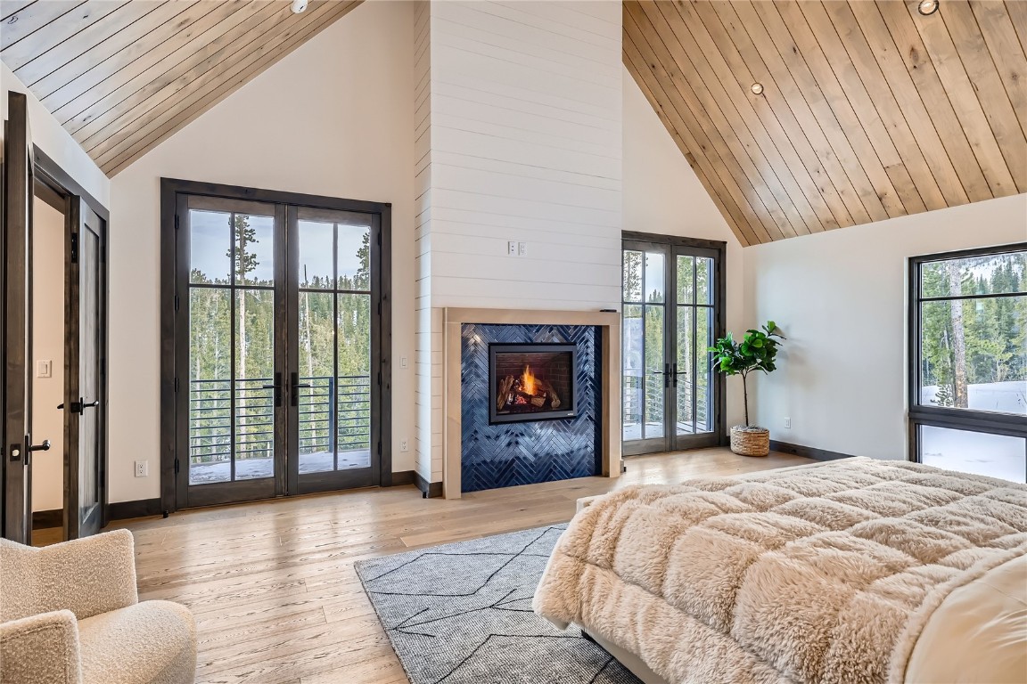 207 Barton Ridge Drive Breckenridge, CO 80424 - Photo 24 of 50 a bedroom with a bed and a large window