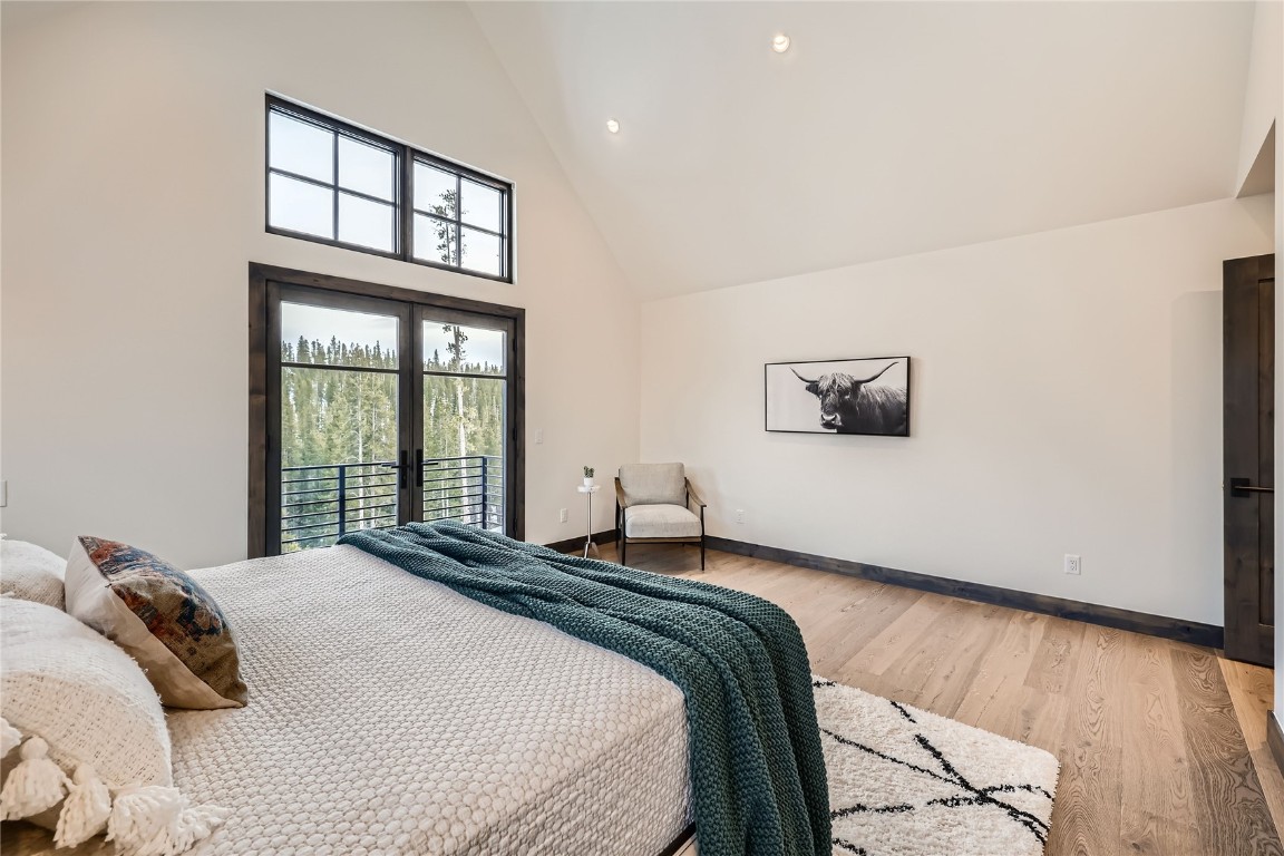 207 Barton Ridge Drive Breckenridge, CO 80424 - Photo 26 of 50 a bedroom with a bed and a window