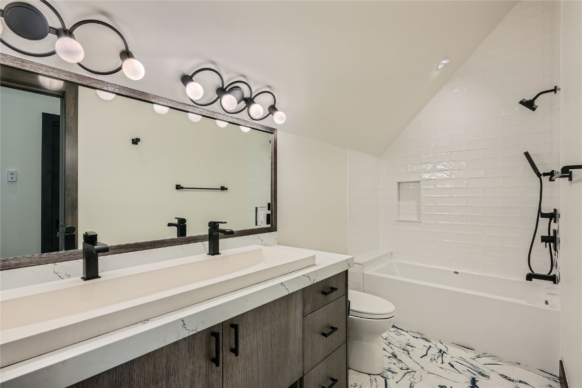 207 Barton Ridge Drive Breckenridge, CO 80424 - Photo 30 of 50 a bathroom with a sink a toilet and a bathtub