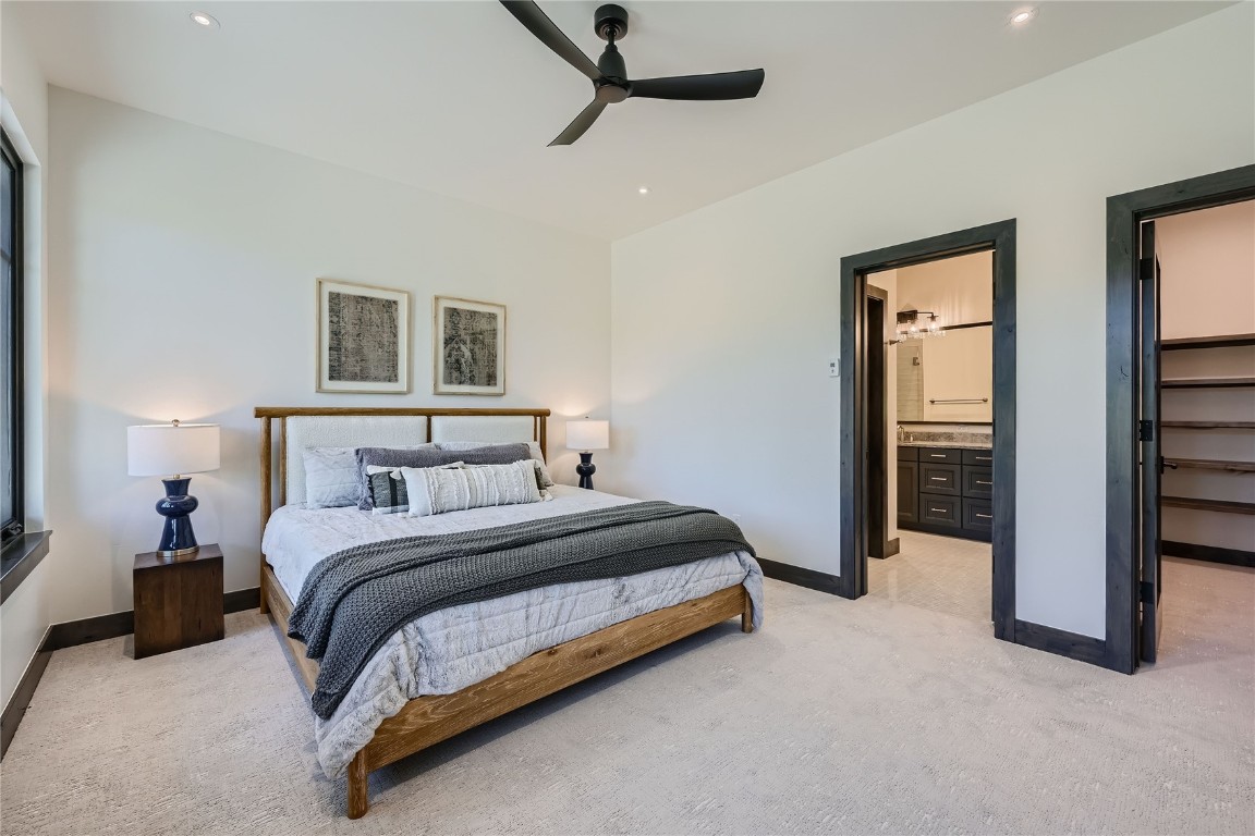 207 Barton Ridge Drive Breckenridge, CO 80424 - Photo 36 of 50 a spacious bedroom with a bed and a cabinets