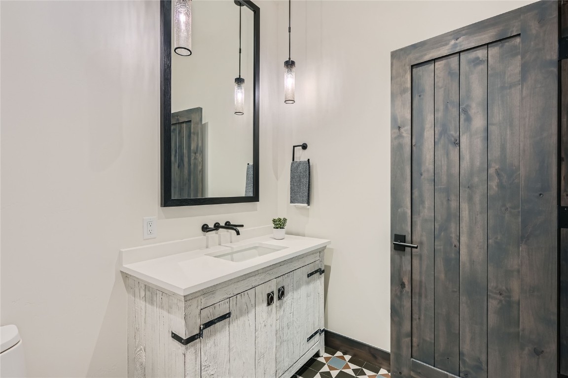 207 Barton Ridge Drive Breckenridge, CO 80424 - Photo 38 of 50 a bathroom with a sink and a mirror