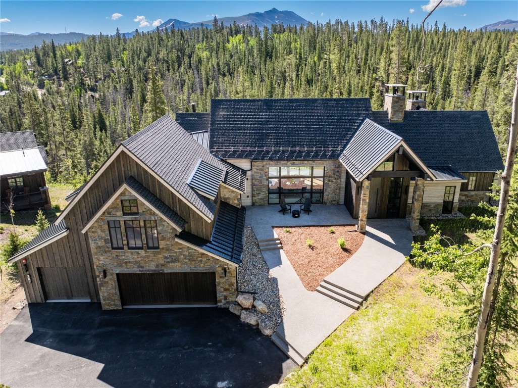 207 Barton Ridge Drive Breckenridge, CO 80424 - Photo 47 of 50 a terrace of a house with wooden floor and outdoor space