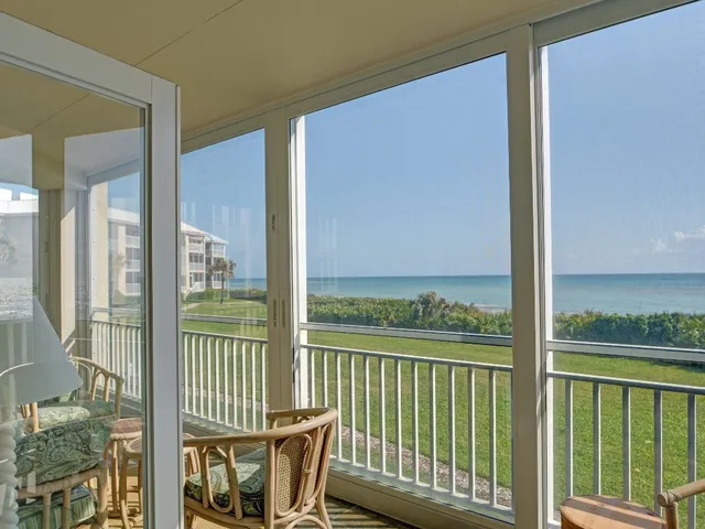 a view of a city from a porch