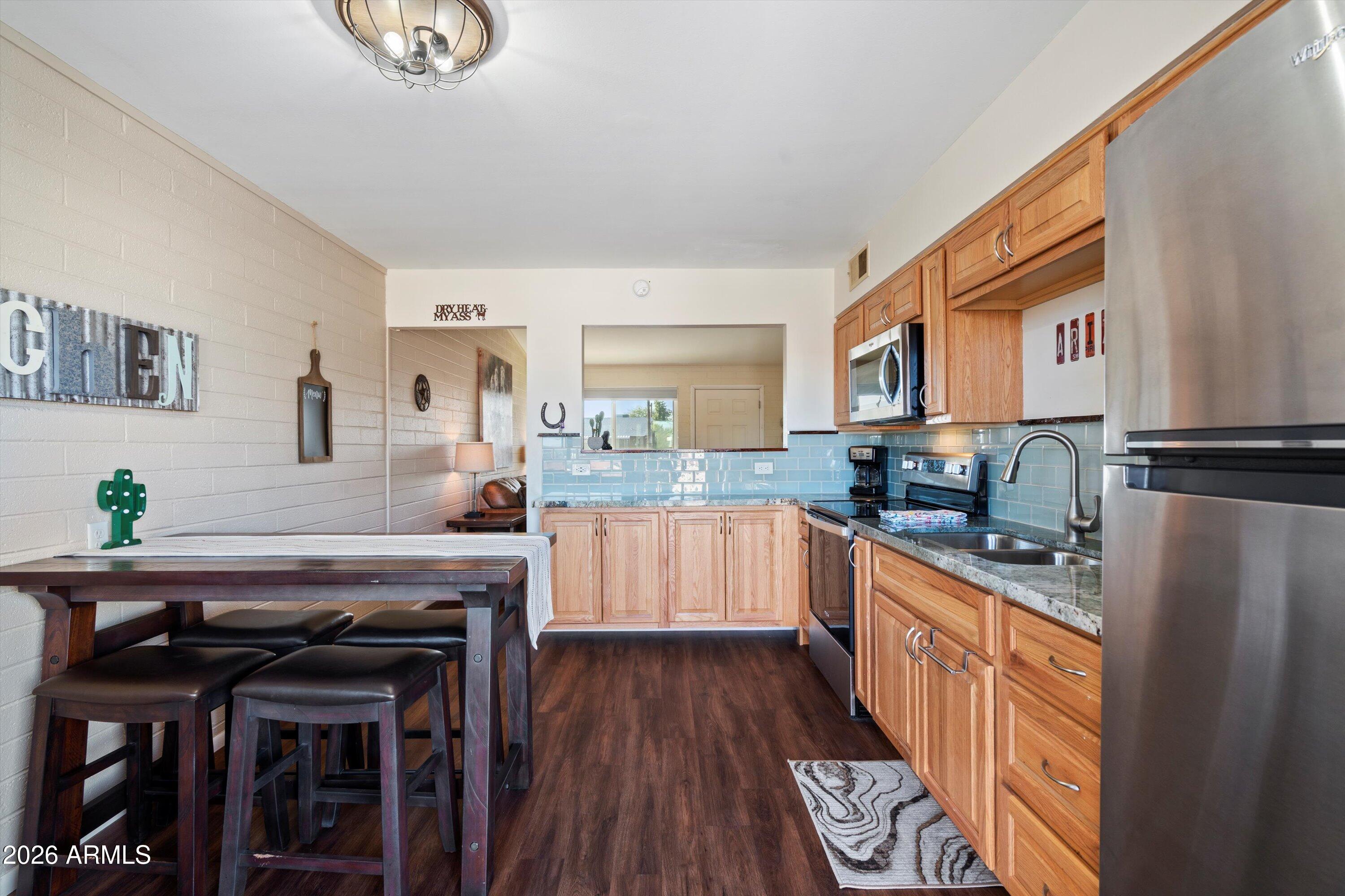 1908 West Berridge Lane, Unit 11 Phoenix, AZ 85015 - Photo 12 of 23 10-Kitchen