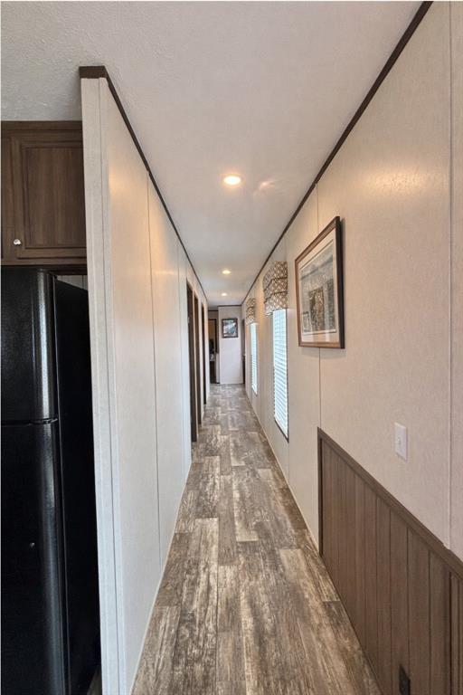 750 Waterfront Row Quitman, TX 75783 - Photo 12 of 32 a view of a hallway with wooden floor
