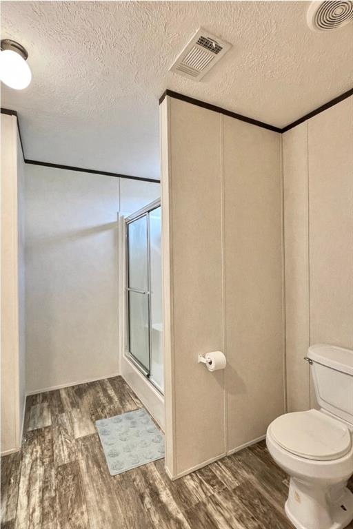 750 Waterfront Row Quitman, TX 75783 - Photo 18 of 32 a bathroom with a sink and a toilet