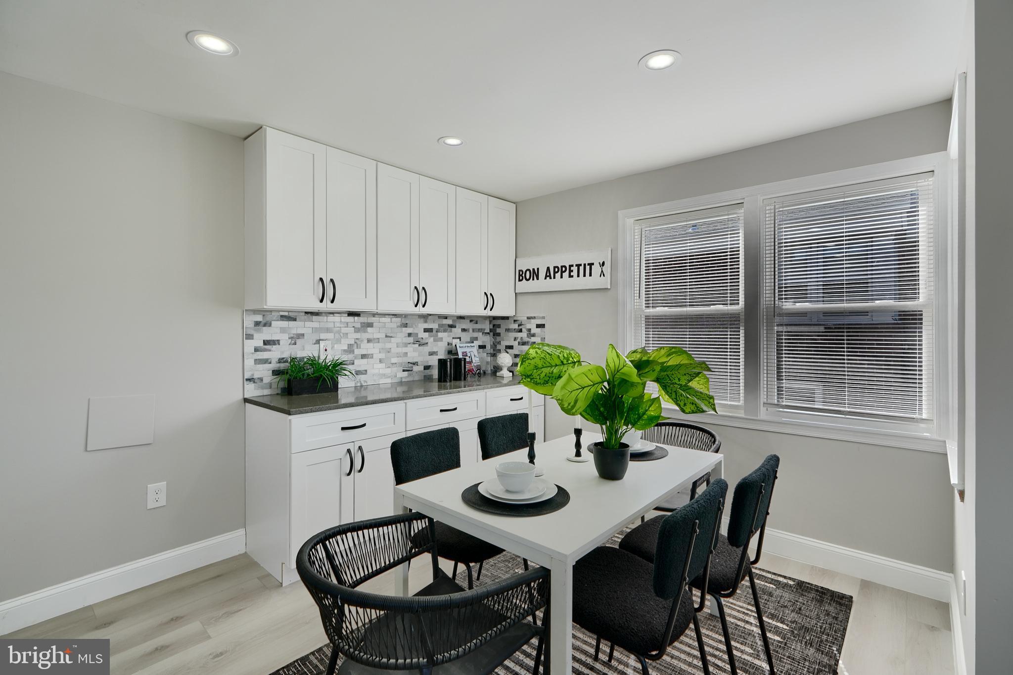 5805 Key Avenue Baltimore, MD 21215 - Photo 14 of 39 a view of a dining room with furniture and window