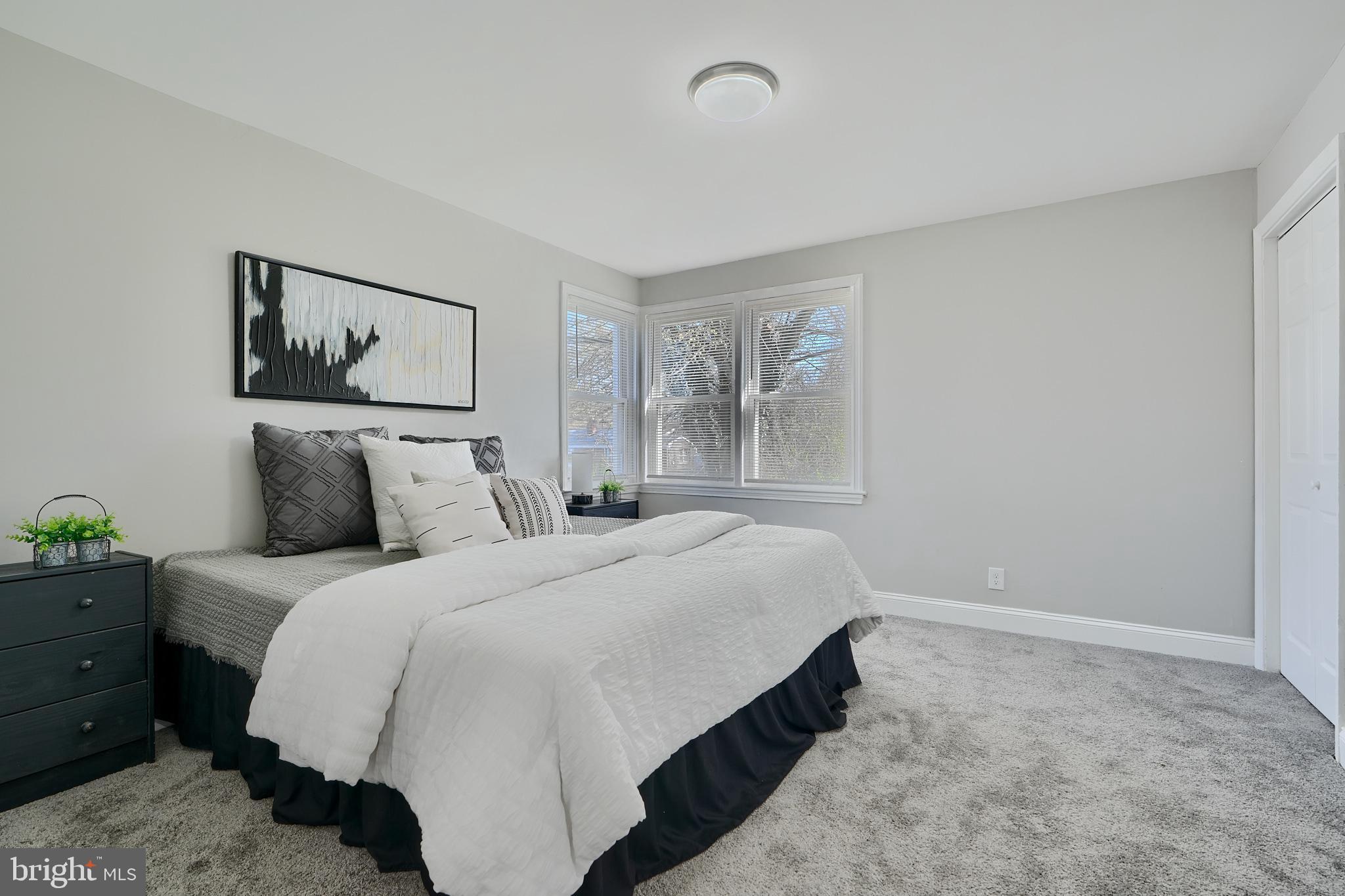 5805 Key Avenue Baltimore, MD 21215 - Photo 19 of 39 a bedroom with bed and window