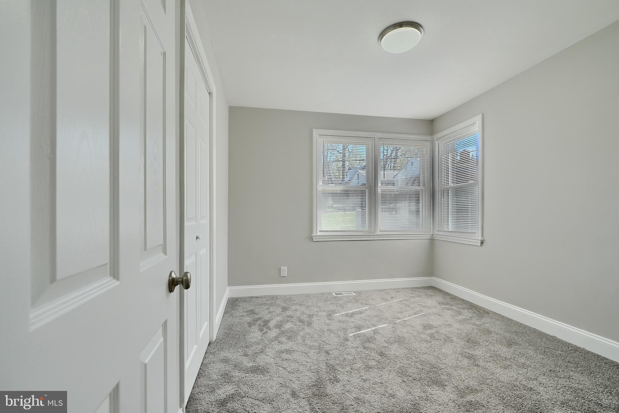 5805 Key Avenue Baltimore, MD 21215 - Photo 23 of 39 a big room with windows and closet