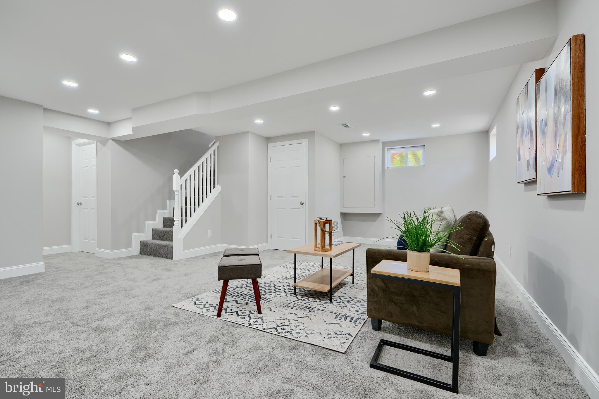 5805 Key Avenue Baltimore, MD 21215 - Photo 28 of 39 a living room with furniture and a wooden floor