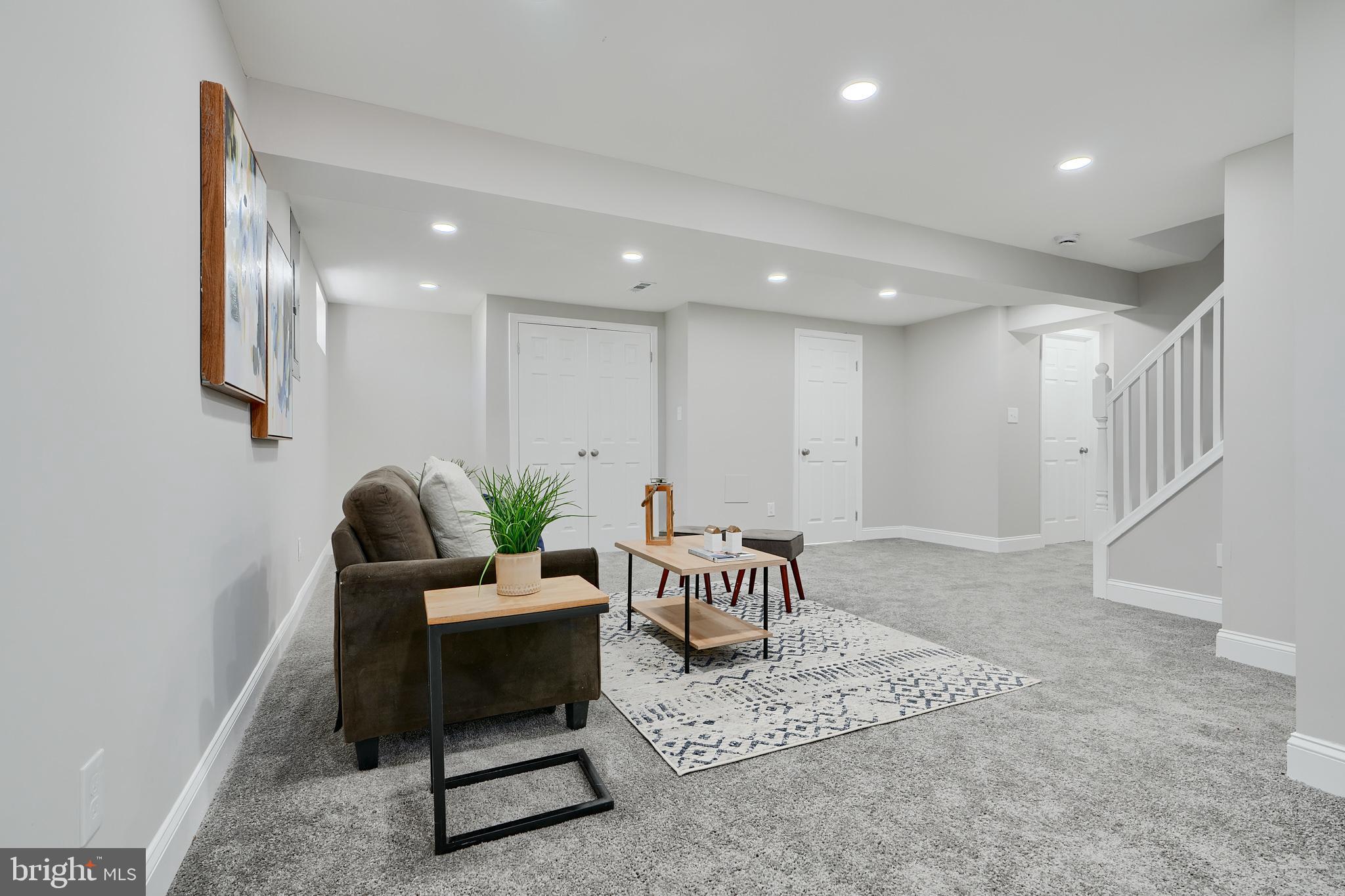 5805 Key Avenue Baltimore, MD 21215 - Photo 29 of 39 a living room with furniture and a rug