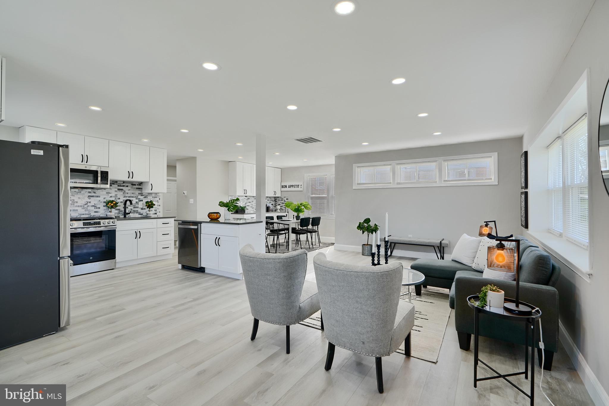 5805 Key Avenue Baltimore, MD 21215 - Photo 3 of 39 a view of a dining room with furniture