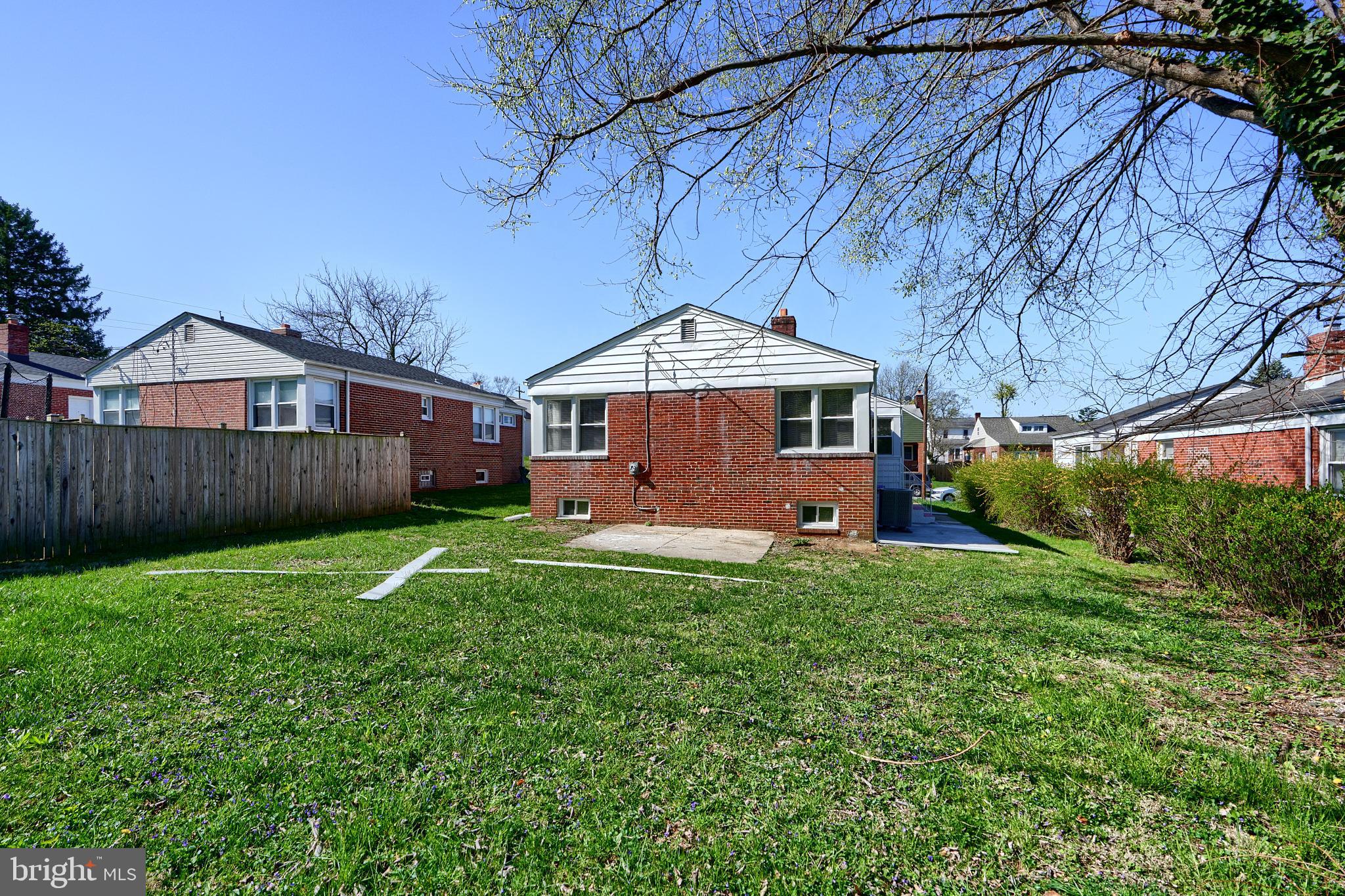 5805 Key Avenue Baltimore, MD 21215 - Photo 39 of 39 a front view of a house with yard and green space