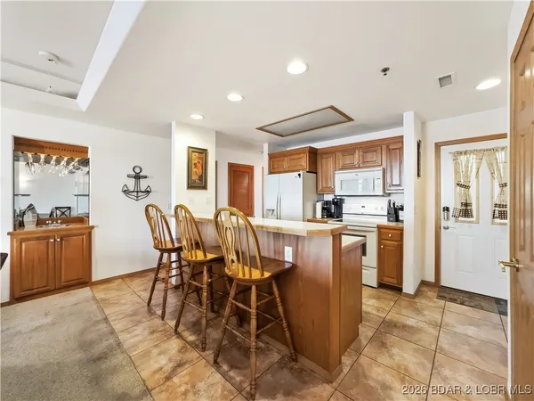 $239,900 | 50 Aqua Finn Drive, Unit 2A, Lake Ozark, MO 65049