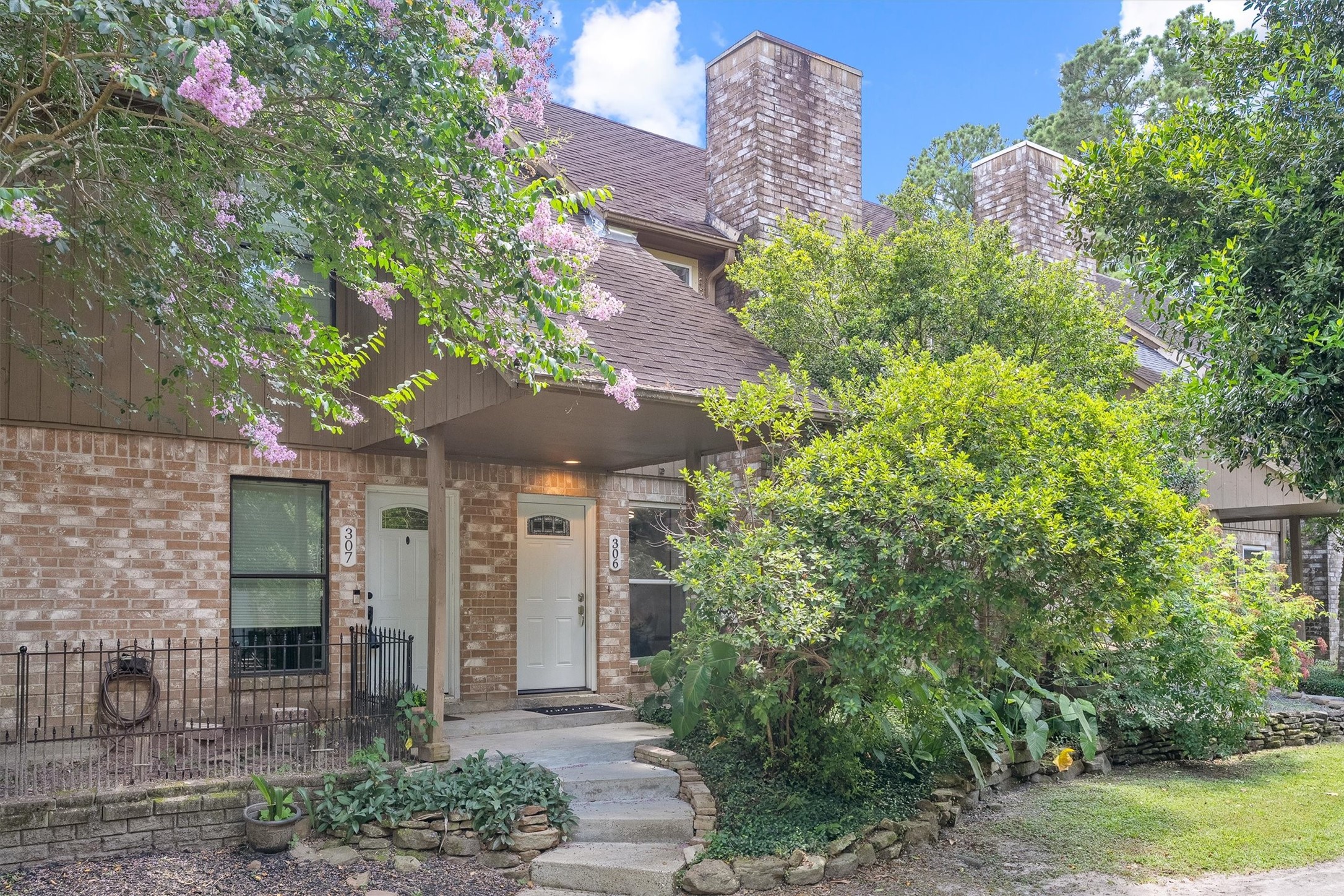 1011 Hamblen Road, Unit 306 Houston, TX 77339 - Photo 1 of 38 Welcome to 1011 Hamblen Rd #306! This charming brick condo greets you with mature landscaping, blooming color, and a covered entry that already has us wanting to see what's behind that door.
