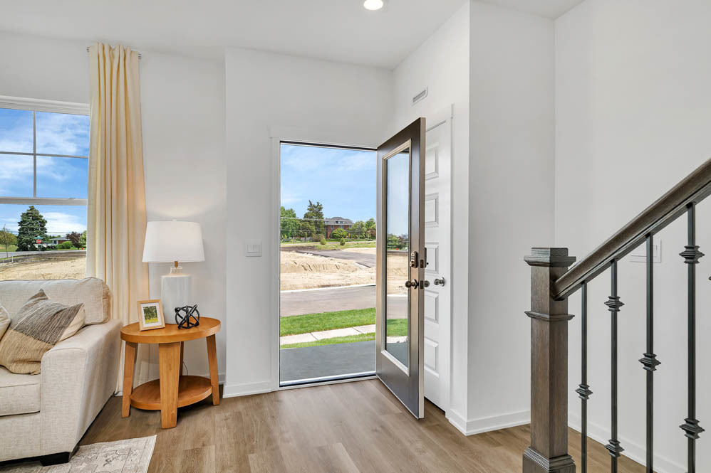 2268 Barbera Road Oswego, IL 60543 - Photo 4 of 23 a room with furniture and a window