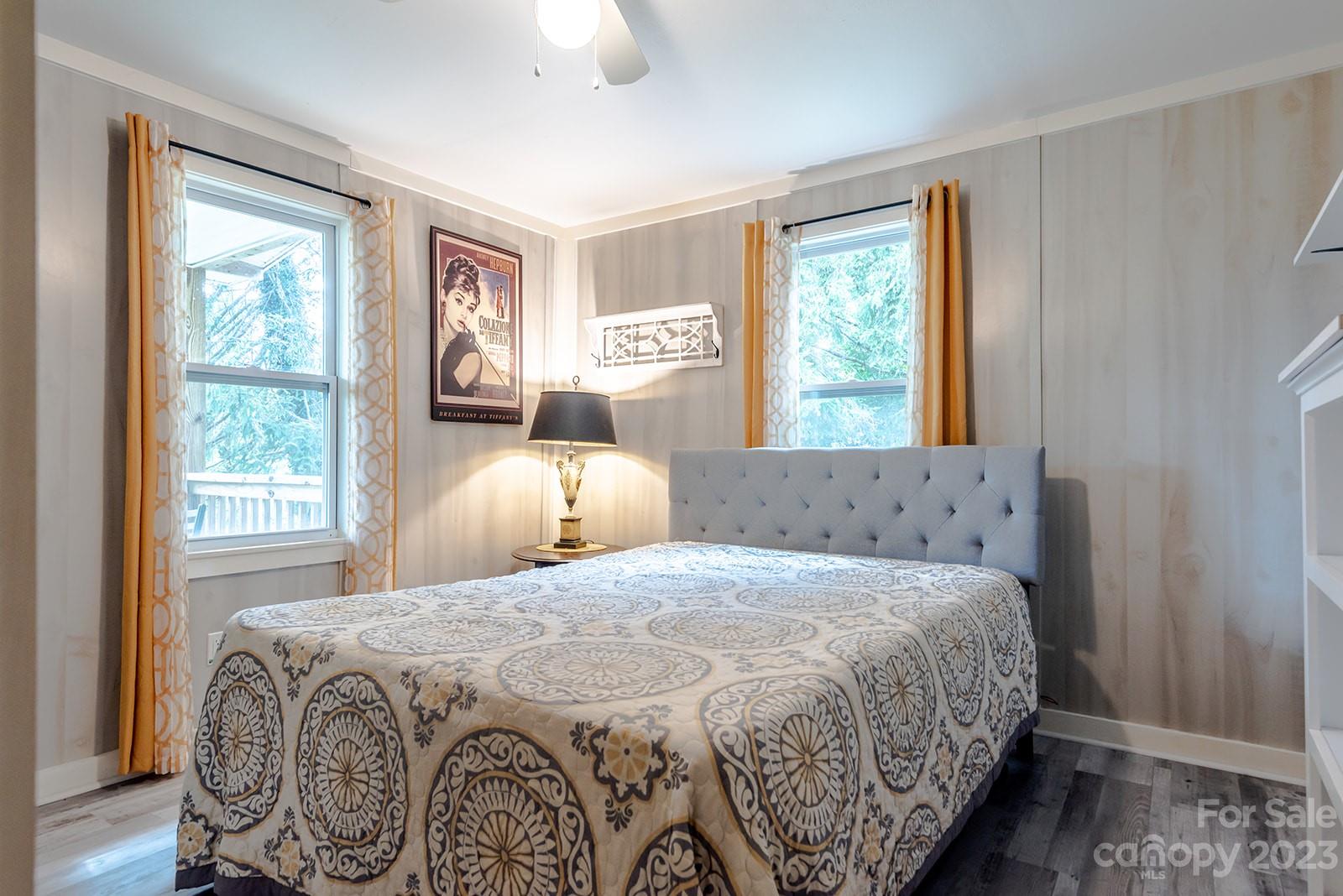 653 Sand Hill Road Asheville, NC 28806 - Photo 21 of 27 a bedroom with a large bed and a window