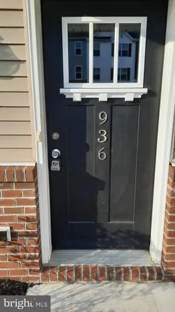 a view of entrance gate of the house and window
