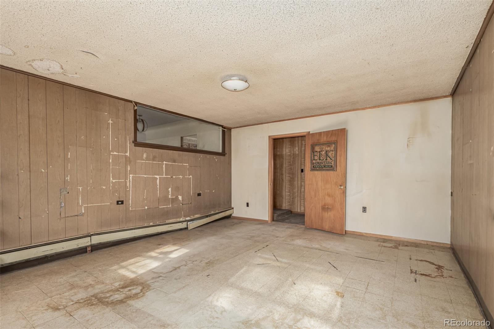 10480 West 47th Avenue Wheat Ridge, CO 80033 - Photo 21 of 29 a view of an empty room