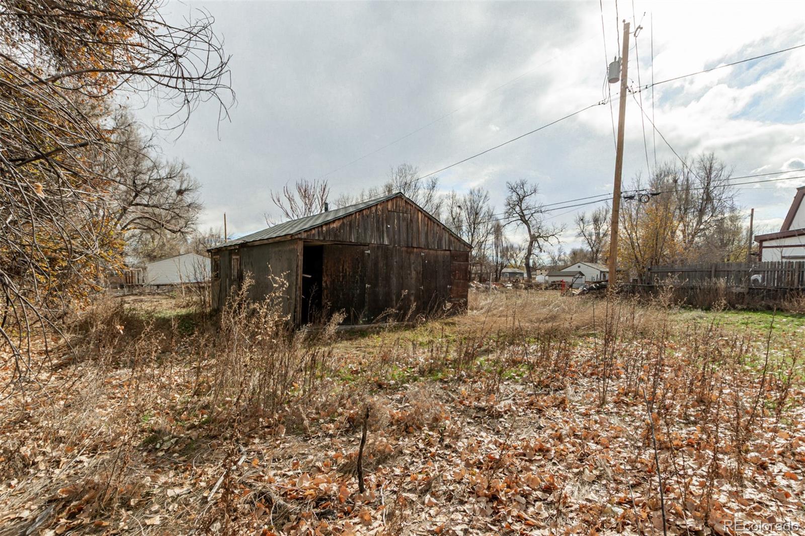 10480 West 47th Avenue Wheat Ridge, CO 80033 - Photo 29 of 29 a view of a house with a yard