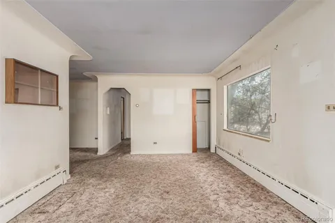 a view of a storage & utility room with a sink