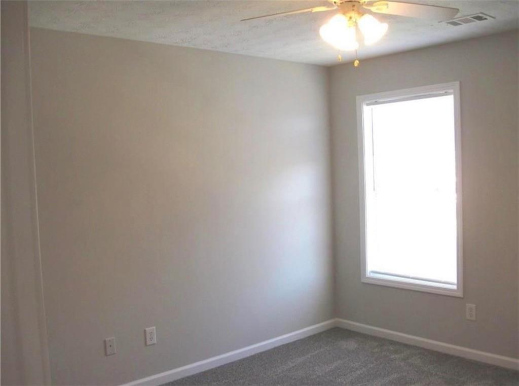 2225 Blue Ridge Lane Conyers, GA 30012 - Photo 22 of 40 an empty room with a window