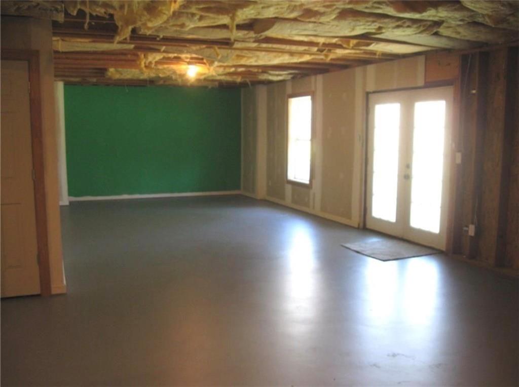 2225 Blue Ridge Lane Conyers, GA 30012 - Photo 30 of 40 a view of a room with wooden floor and windows