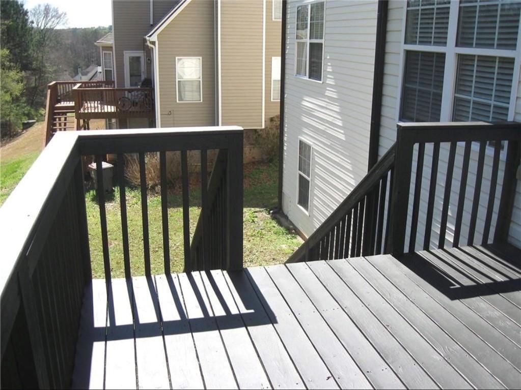 2225 Blue Ridge Lane Conyers, GA 30012 - Photo 32 of 40 a view of balcony with wooden floor