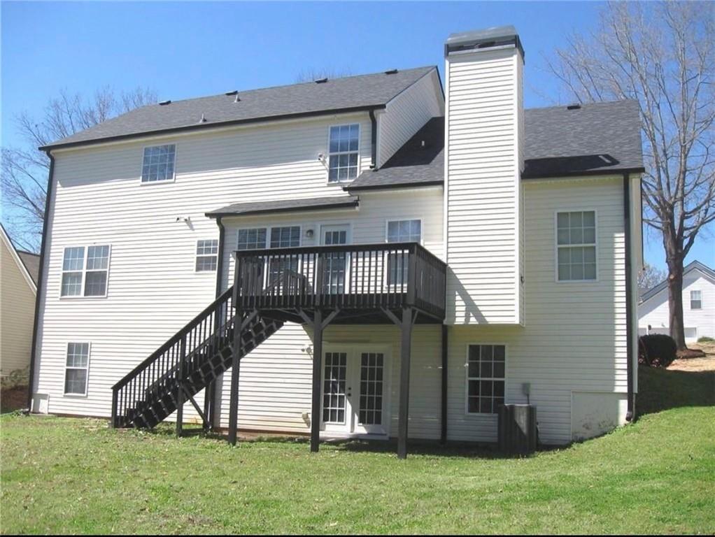 2225 Blue Ridge Lane Conyers, GA 30012 - Photo 36 of 40 a view of a house with a yard