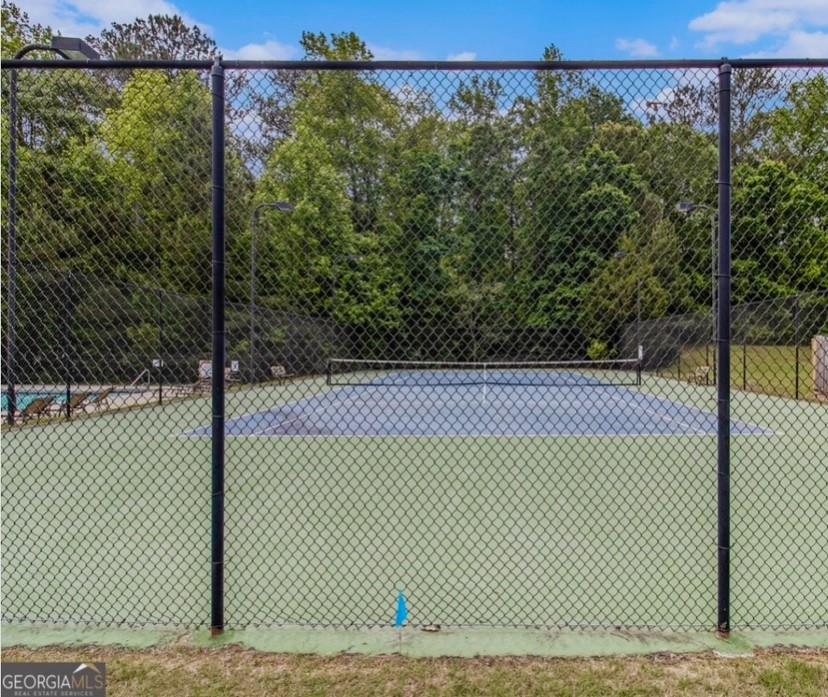 2225 Blue Ridge Lane Conyers, GA 30012 - Photo 40 of 40 a view of a tennis court with a tennis court