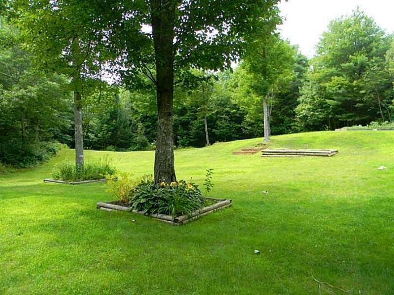 67 Maple Grove South China, ME 04358 - Photo 10 of 33 Backyard in Sprintime