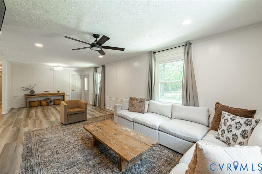 12397 New Market Mill Road Beaverdam, VA 23015 - Photo 4 of 44 a living room with furniture and a large window