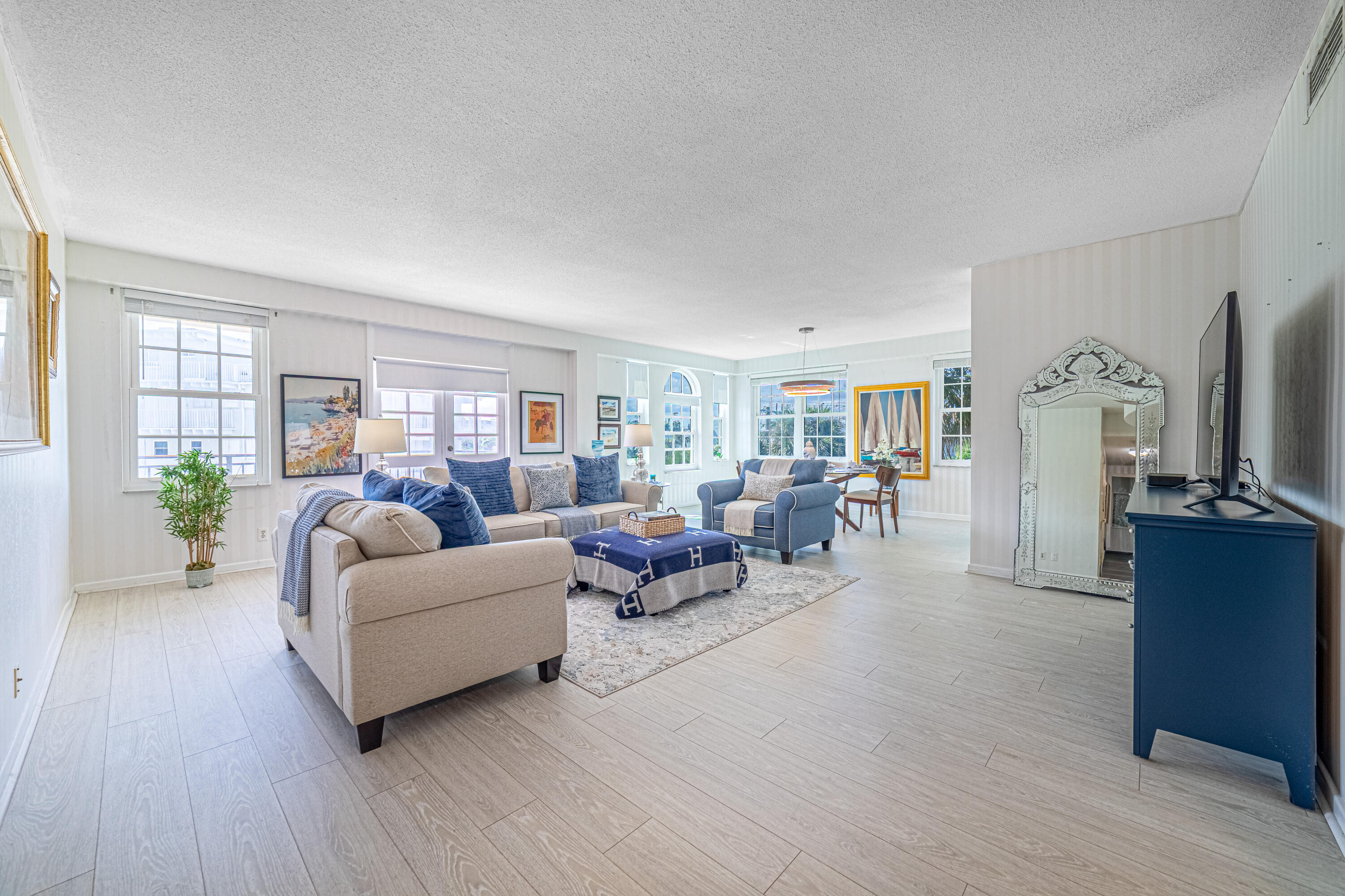 3475 South Ocean Boulevard, Unit 201 Palm Beach, FL 33480 - Photo 2 of 28 a living room with furniture and wooden floor