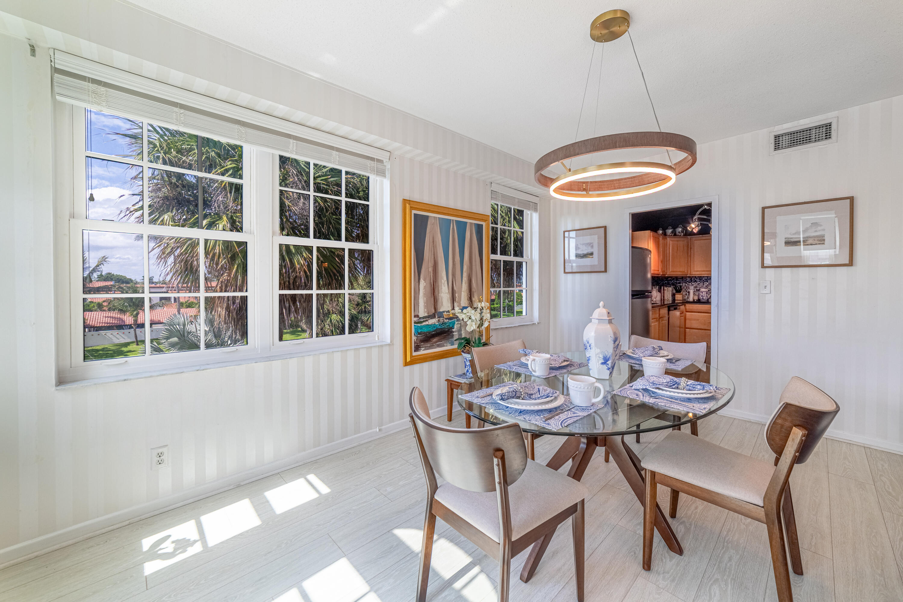 3475 South Ocean Boulevard, Unit 201 Palm Beach, FL 33480 - Photo 7 of 28 a dining room with furniture and window