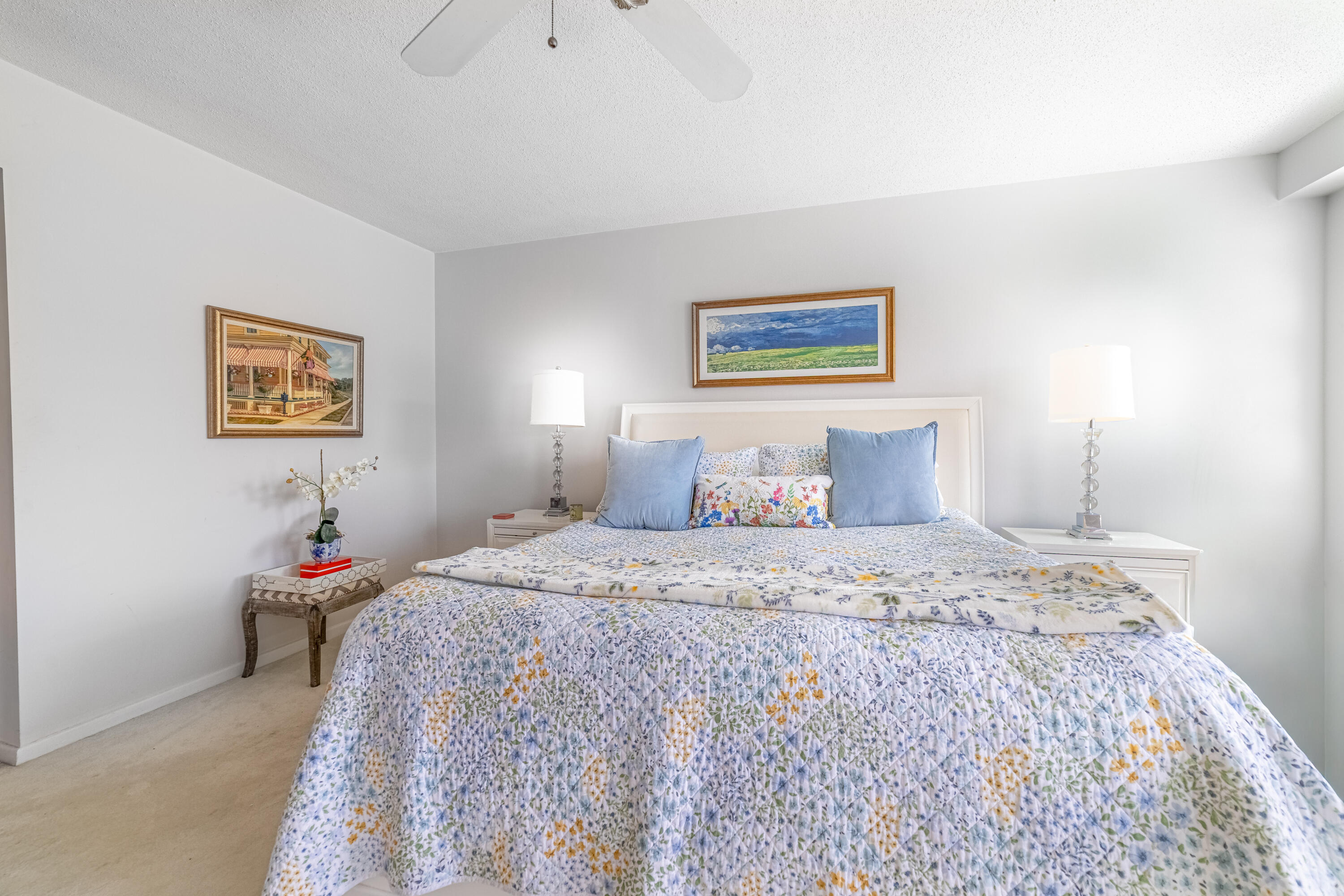 3475 South Ocean Boulevard, Unit 201 Palm Beach, FL 33480 - Photo 10 of 28 a bedroom with a bed and a painting on the wall