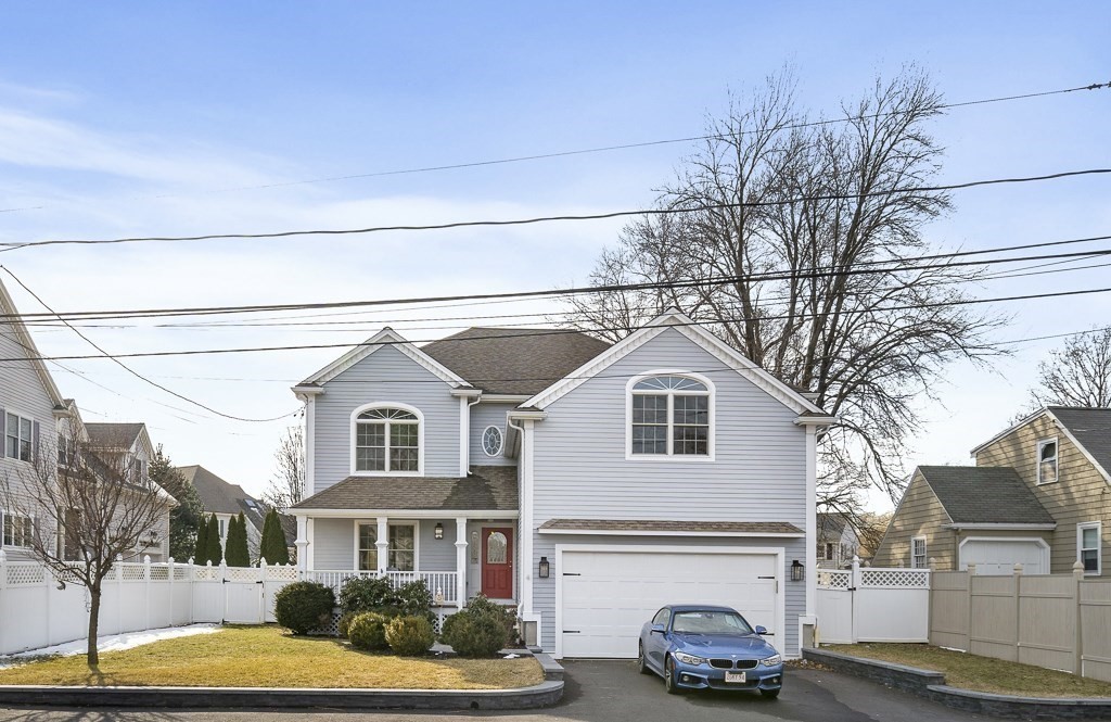 4 Colonial Drive Arlington, MA 02474 - Photo 1 of 19 a view of a white house with a large windows