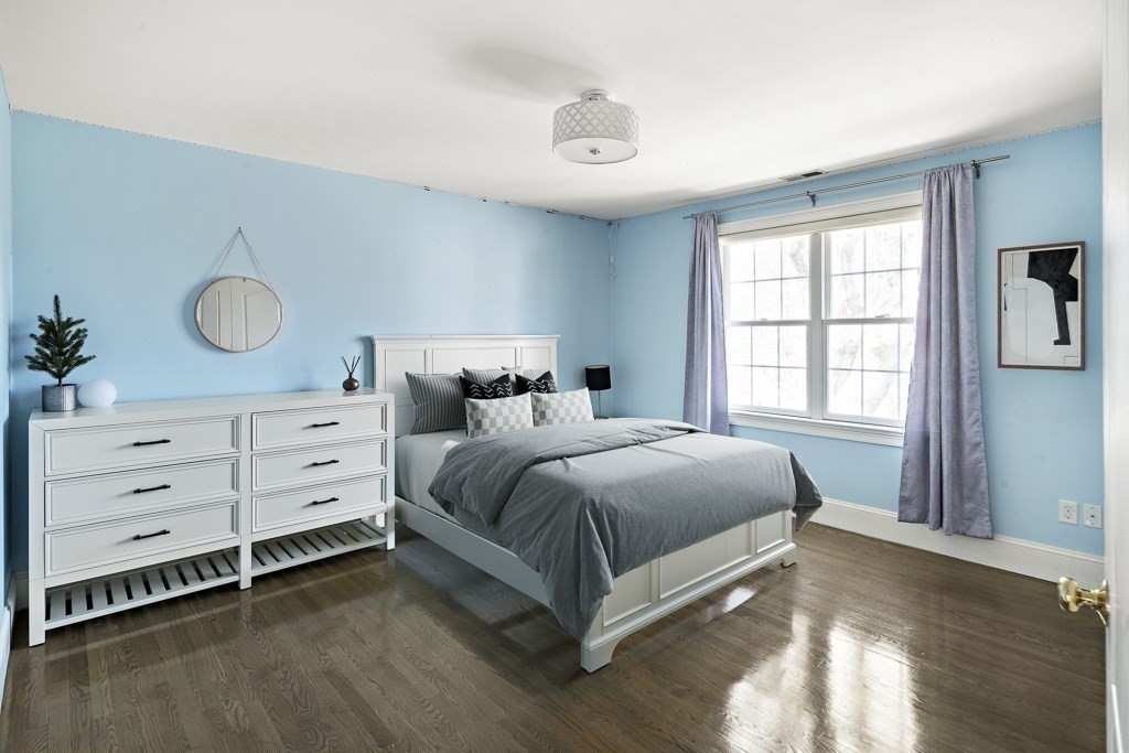 4 Colonial Drive Arlington, MA 02474 - Photo 13 of 19 a bedroom with a bed and a window