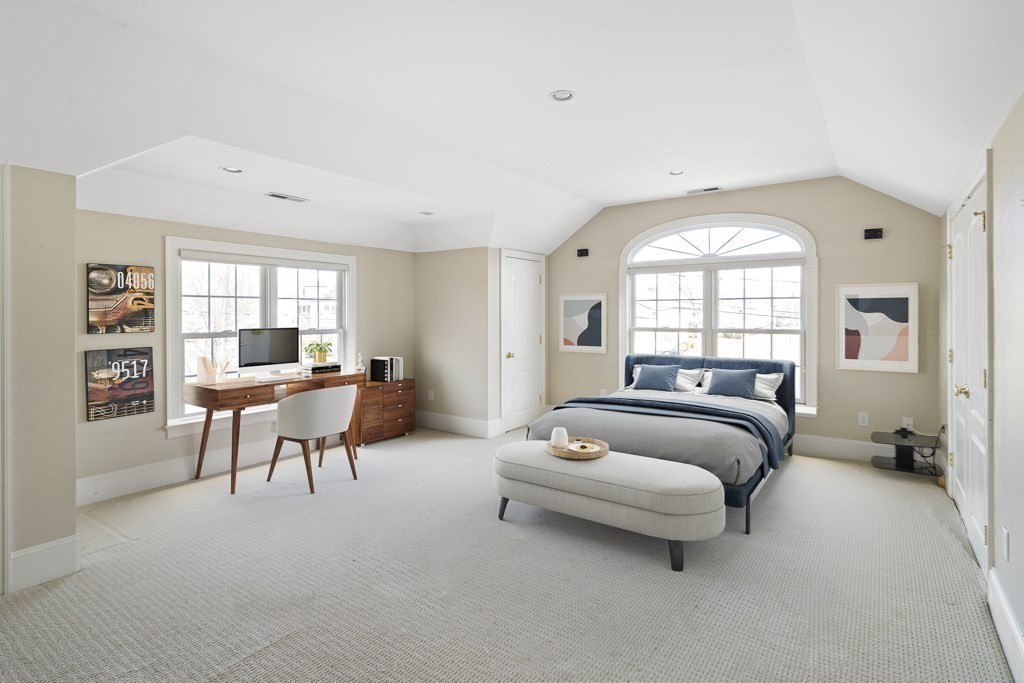 4 Colonial Drive Arlington, MA 02474 - Photo 14 of 19 a living room with furniture and a large window