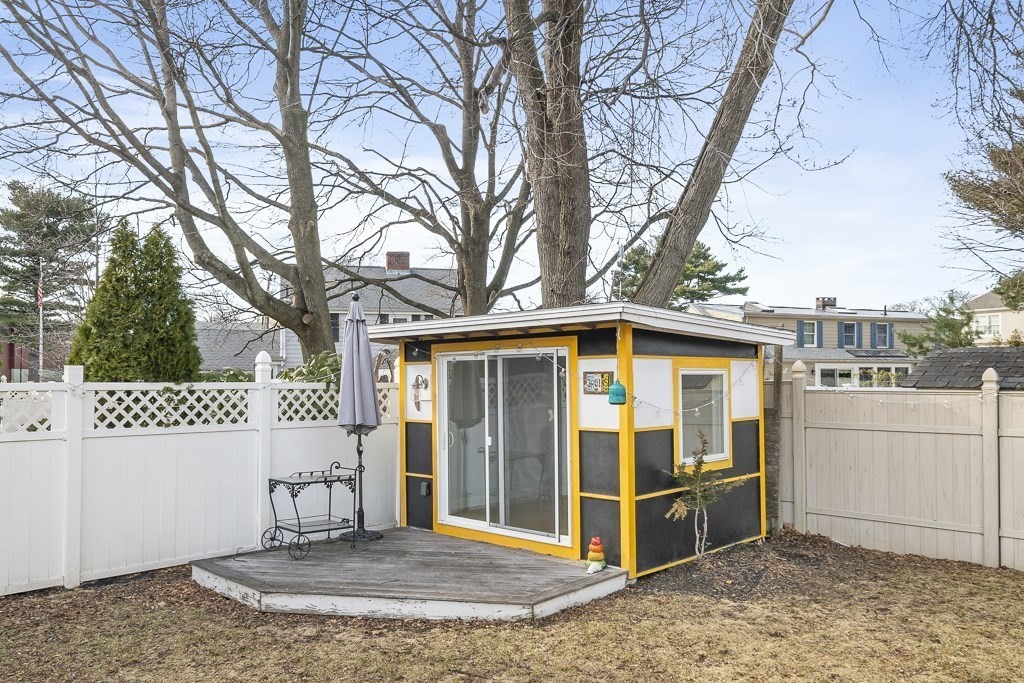 4 Colonial Drive Arlington, MA 02474 - Photo 18 of 19 a view of a house with a yard