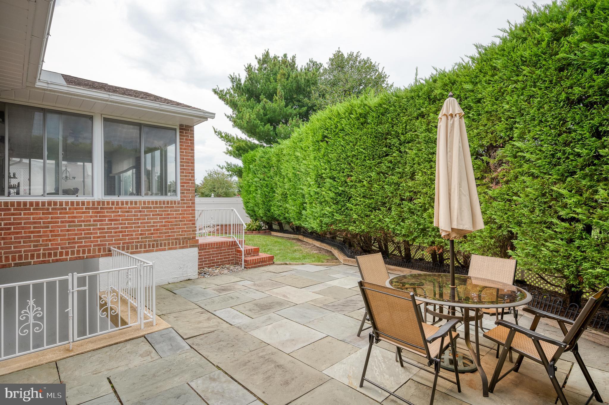 9218 Gardenia Road Nottingham, MD 21236 - Photo 47 of 49 PATIO OFF THE SUN ROOM