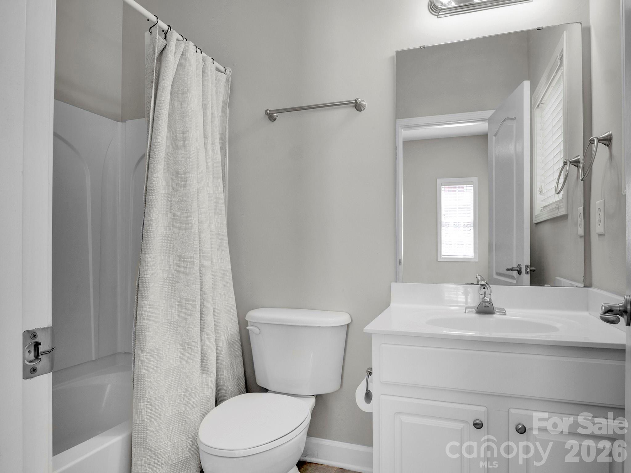 140 Singleton Road Mooresville, NC 28117 - Photo 14 of 17 a bathroom with a sink a toilet and shower