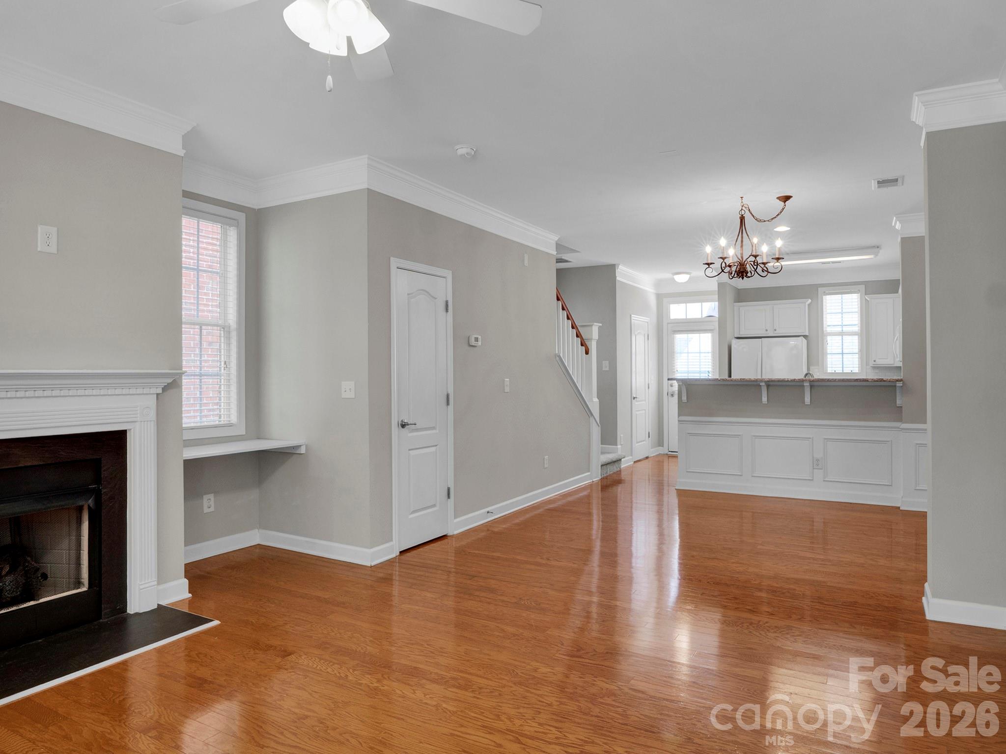 140 Singleton Road Mooresville, NC 28117 - Photo 3 of 17 a view of a kitchen with a sink and a fireplace