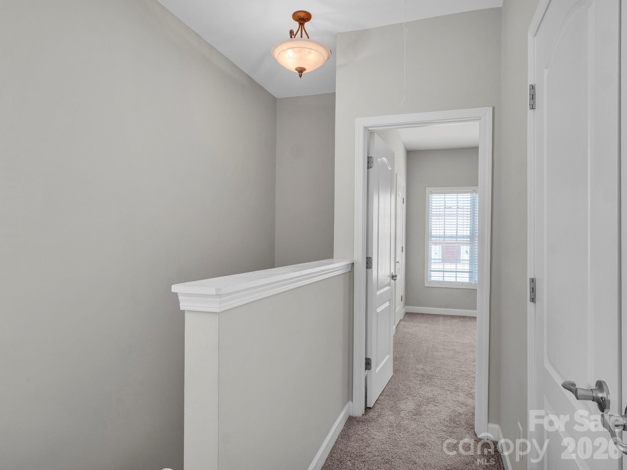 140 Singleton Road Mooresville, NC 28117 - Photo 8 of 17 a view of a hallway with closet