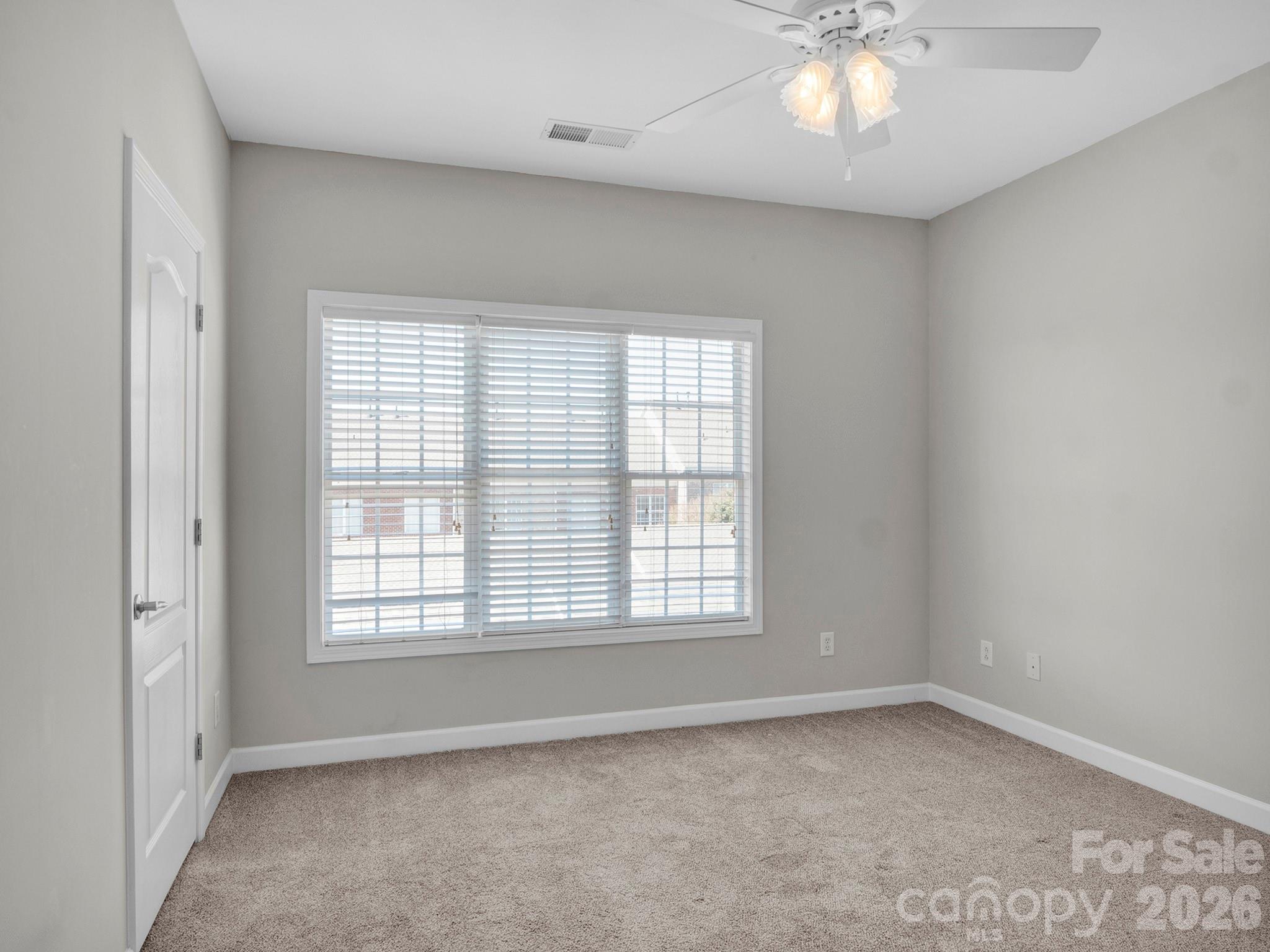 140 Singleton Road Mooresville, NC 28117 - Photo 9 of 17 an empty room with a window
